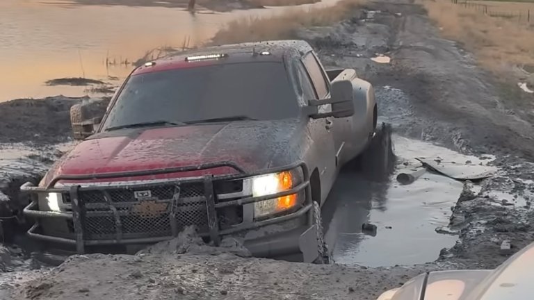 Chevrolet pickup stuck in mud on the Road of Shame